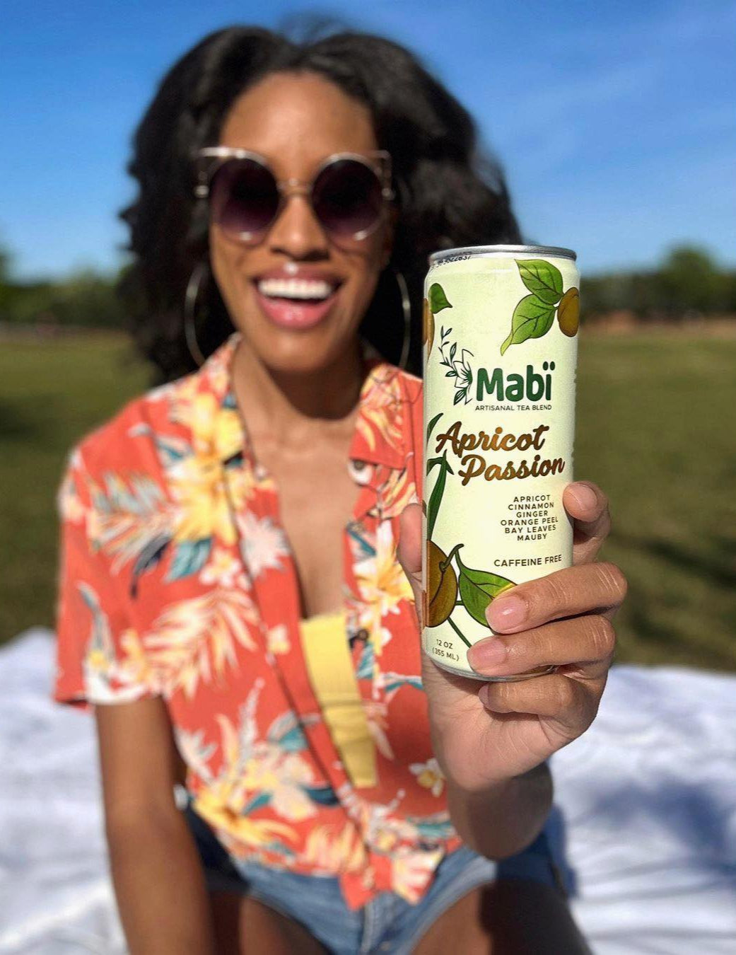 woman with the can of cold brewed Mabi tea